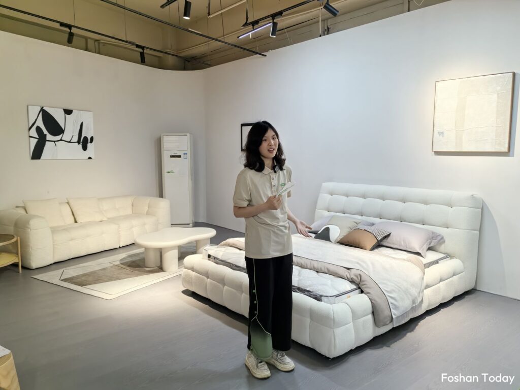 bed and sofa in a Foshan factory showroom